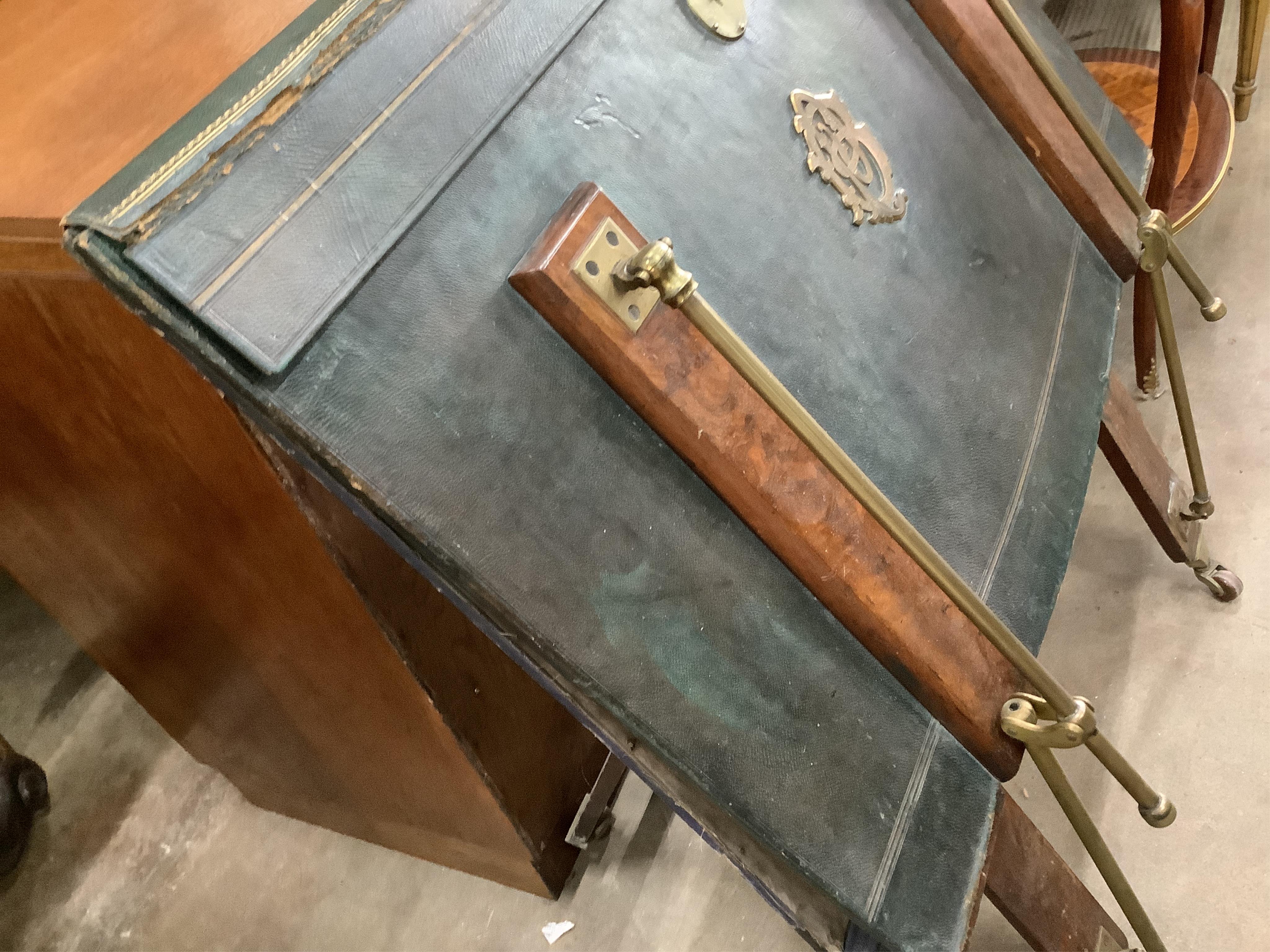 A Victorian brass mounted green morocco folio stand, width 82cm, height 90cm